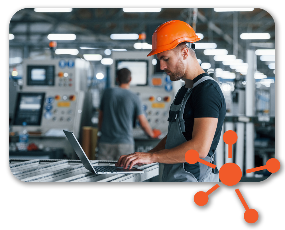 Manufacturing Technology Man in hard hat using manufacturing Technology