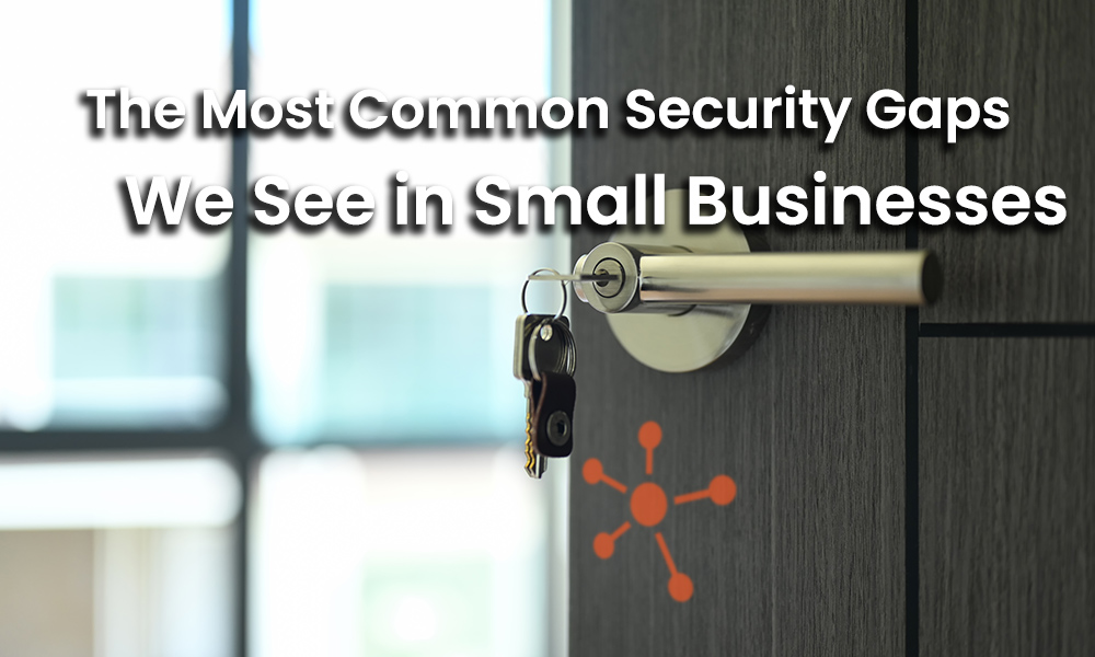 Open door with keys in the lock creating a security gap